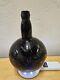 1836 Scottish Stippled Black Glass Wine Bottle