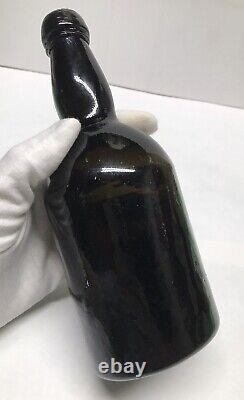 1840s S. F. RUM BOTTLE BLACK GLASS