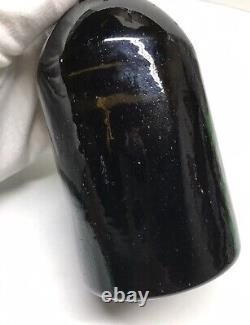 1840s S. F. RUM BOTTLE BLACK GLASS