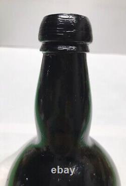 1840s S. F. RUM BOTTLE BLACK GLASS