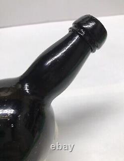 1840s S. F. RUM BOTTLE BLACK GLASS