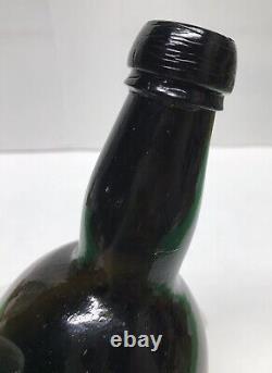 1840s S. F. RUM BOTTLE BLACK GLASS