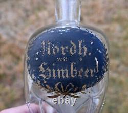 18th CENTURY BLOWN GLASS GERMAN KUTTROLF BOTTLE WITH PAINTED LABEL