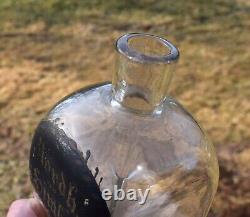 18th CENTURY BLOWN GLASS GERMAN KUTTROLF BOTTLE WITH PAINTED LABEL