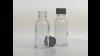 1 Oz 30ml Boston Round Clear Glass Bottle With Black Phenolic Cone Lined Cap
