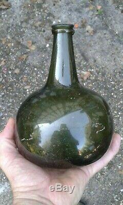 A Lovely Free Blown Onion Shape Pontilled Black Glass Bottle C1720