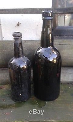 A Lovely Sealed (Dragon Head) Large Magnum size Black Glass Bottle