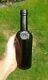 A Lovely Split Size Sealed Hwc Black Glass Wine Bottle