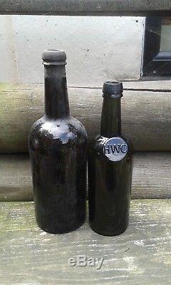 A Nice Early Sealed (HWC) Split Size English Black Glass Bottle (empty)