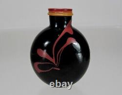 A RARE Cinnabar-Red Overlay Black Glass Snuff Bottle, Qing Dynasty, 18th/19th C
