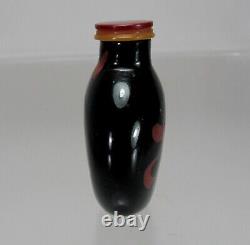 A RARE Cinnabar-Red Overlay Black Glass Snuff Bottle, Qing Dynasty, 18th/19th C