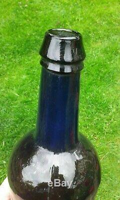 A Stunning Sealed A. S. C. R All Souls College Black Glass Bottle C1830