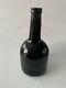 An Antique Black Glass Bottle From The End Of The 18th. Century, Onion Bottle
