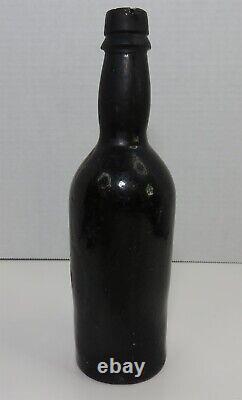 Antique 9 Inch Black Glass Bottle With Pontil On Bottom (inv40273)