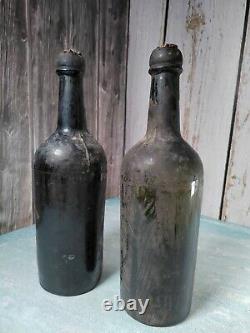 Antique Black Glass Bottles, Two Bottles Height 28 cm