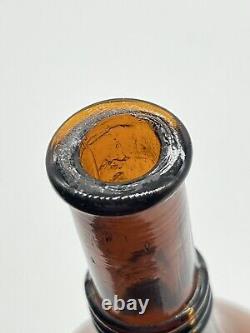 Antique Embossed Label Under Glass Amber Barber Bottle Witch Hazel 7.5