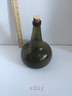Antique green black blown glass onion bottle with applied lip 18th century