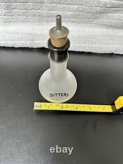 Art Deco Bitters Back Bar Bottle with the Word Bitters in Black