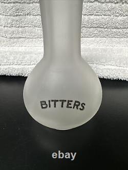 Art Deco Bitters Back Bar Bottle with the Word Bitters in Black