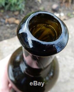 Bagot circa 1780 Staffordshire black glass small sealed wine bottle