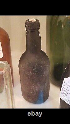 Black glass bottle shipwreck