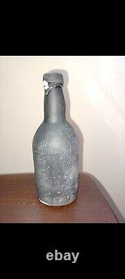 Black glass bottle shipwreck