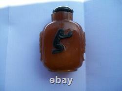Chinese Qing Peking Glass Amber Snuff Bottle Dragon Flower Praying Figure Motif