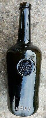 Circa 1770 black glass large cylinder wine bottle. Applied Seal WA