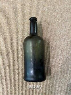 Circa 1800's Black Glass Rum Bottle, Pontil, Bell Shape Bottom