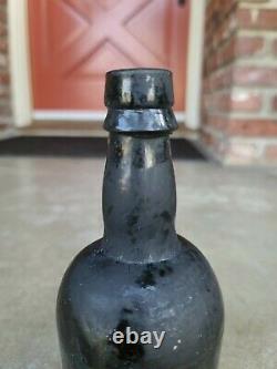 Colonial Black Glass Rum bottle. Rare! A