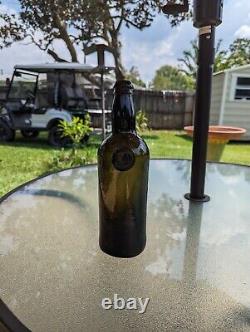 Dated Black Glass Seal Bottle