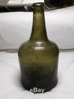 Early 18th Century Black Glass Mallet Bottle Found In South Carolina Waters