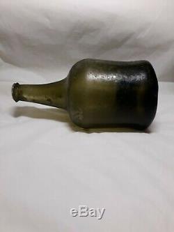 Early 18th Century Black Glass Mallet Bottle Found In South Carolina Waters