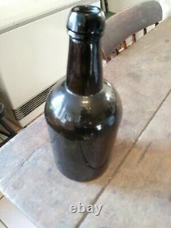 Early Mallet Style Black Glass Bottle