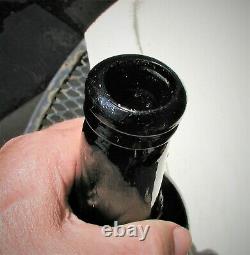 Early Transitional Mallet Black Glass Bottle