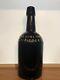 Ed. Quinlivan Black Glass Ale Bottle