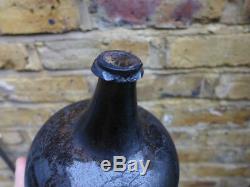 English Black Glass Onion Shaped Wine Bottle Circa Early 1700s