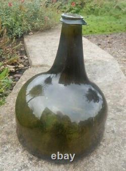 English Mallet black glass (dark green) wine bottle. Circa 1730. Lovely shape