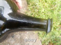 English Mallet black glass (dark green) wine bottle. Circa 1730. Lovely shape