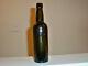 Hand Blown Black Glass Ale Or Beer Bottle