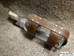 Large medieval style glass bottle with leather holder and 2 closure. LARP