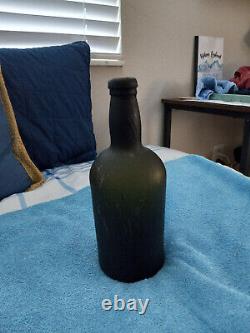 Late 18th Century Black Glass Rum Bottle in Very Good Condition