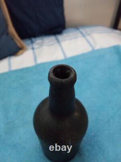 Late 18th Century Black Glass Rum Bottle in Very Good Condition