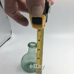 Miniature Green Flask String Lip Kick Up Pontil (black glass Onion Style)