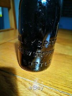 Newcastle Edinburgh Pictorial Black Glass Ginger Beer Bottle