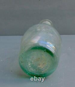 Nice Antique clear green glass medicine bottle, Dutch 18th. Century