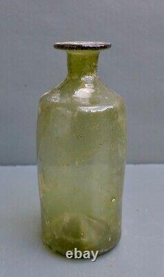 Nice Antique green glass medicine bottle, Dutch, 17th century