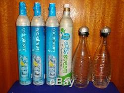 SodaStream Penguin Sparkling Water Soda Maker 2 Glass Carafe Bottle, 4 Co2 TANKS