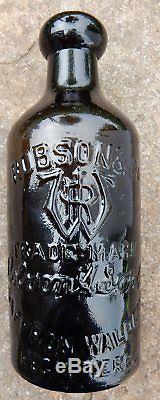 Superb condition black glass mineral ginger beer bottle Robson Saffron Walden