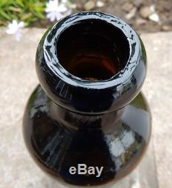 Superb condition black glass mineral ginger beer bottle Robson Saffron Walden